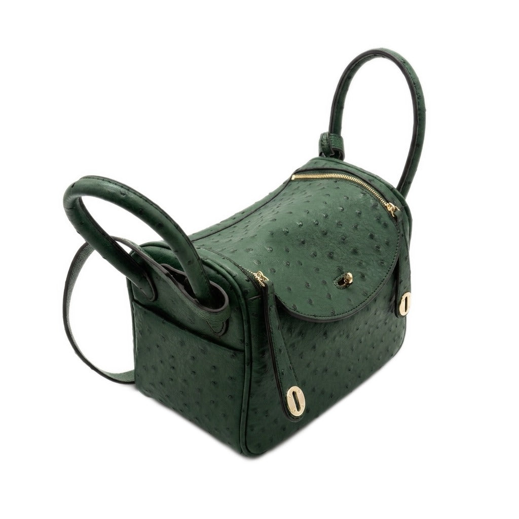 Three-quarter view with the flap closed and the turn-lock fastened