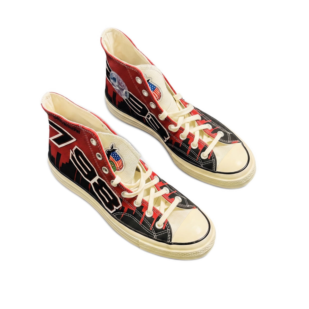 Top-down angled view of both sneakers, showing the laces, tongues, and insoles.