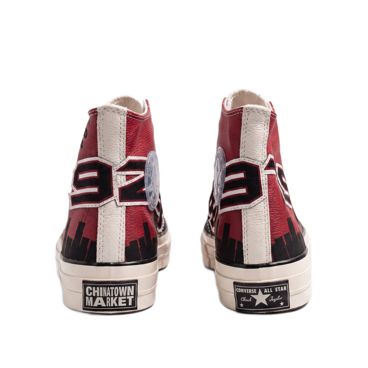 Rear heel view showing the '92' and '93' graphics and brand heel patches.