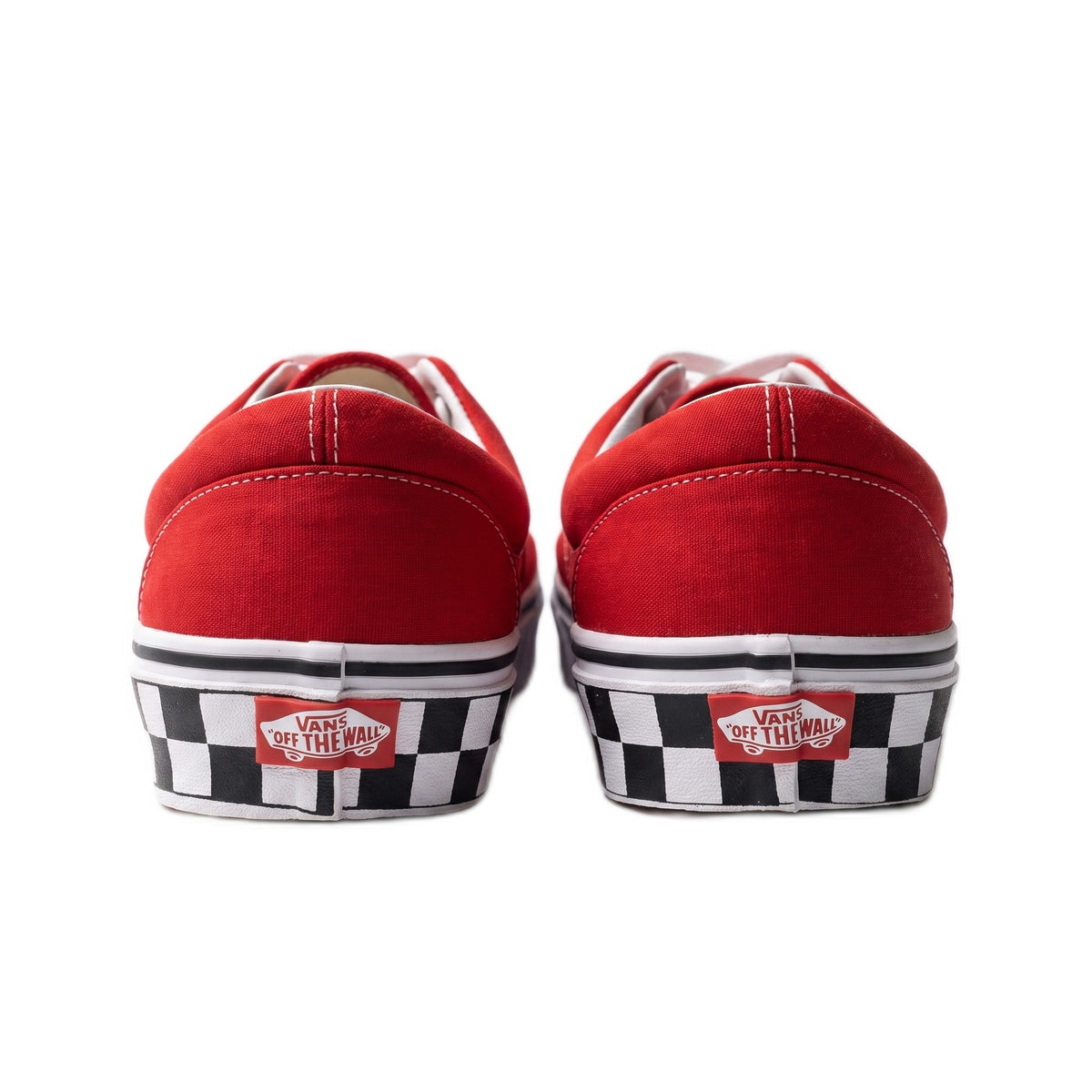 Heel view of the sneakers showing checkerboard accents on the white midsoles.