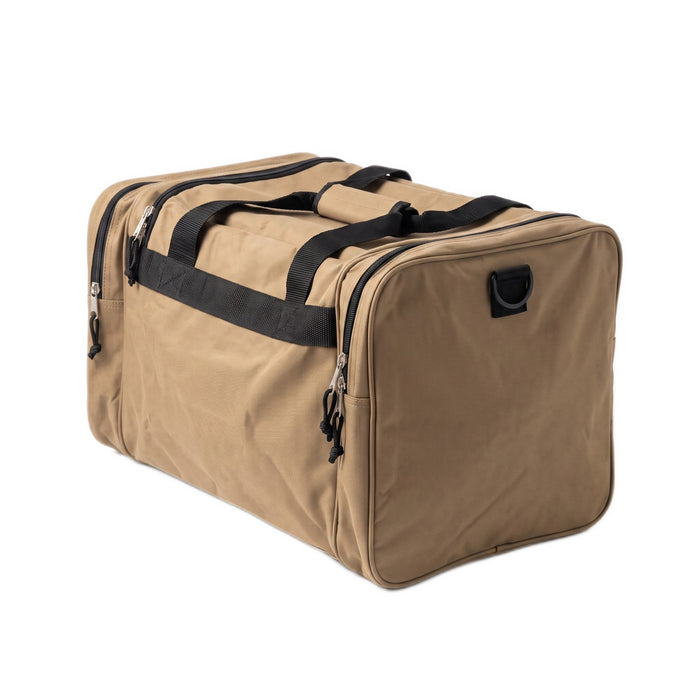 Three-quarter back view showing the plain tan side and zippered end pocket.