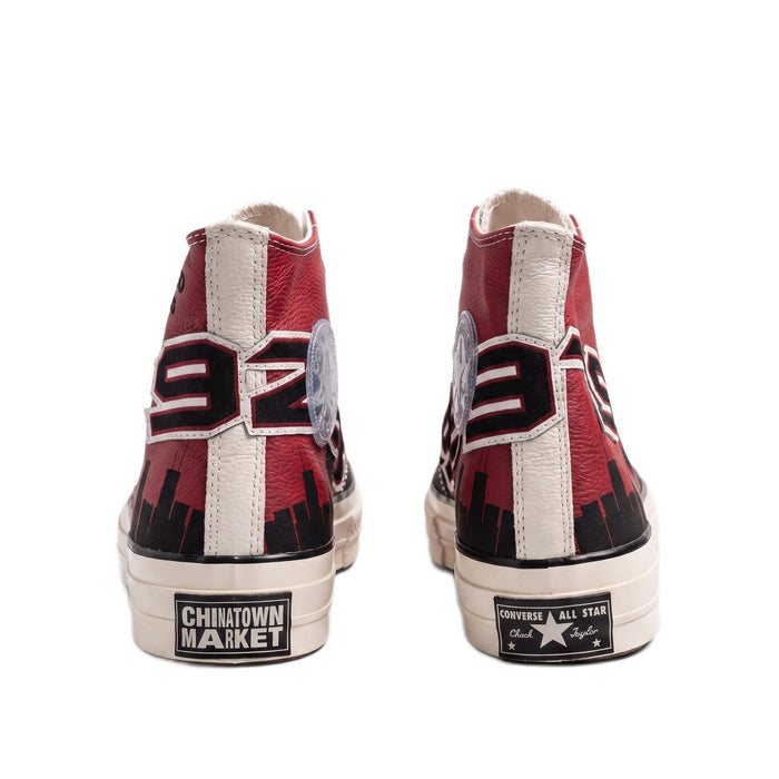Rear heel view showing the '92' and '93' graphics and brand heel patches.