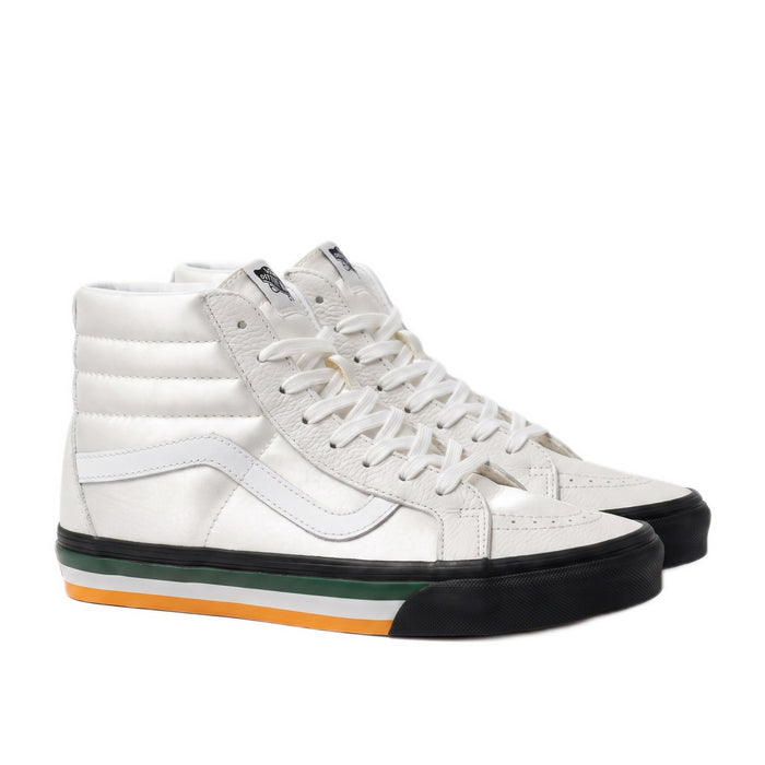 Three-quarter view of white high-top sneakers with black soles and striped heels.