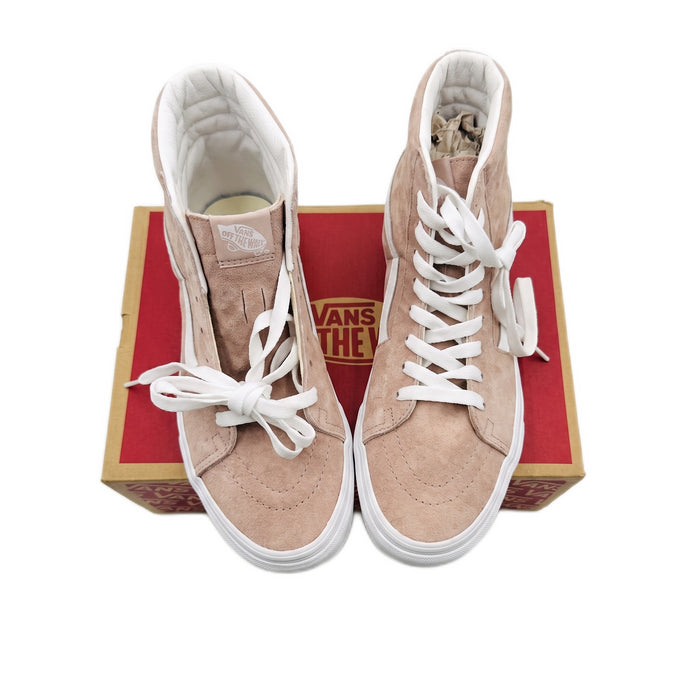 Three-quarter top-down view of the high-top sneakers resting on their red shoebox.