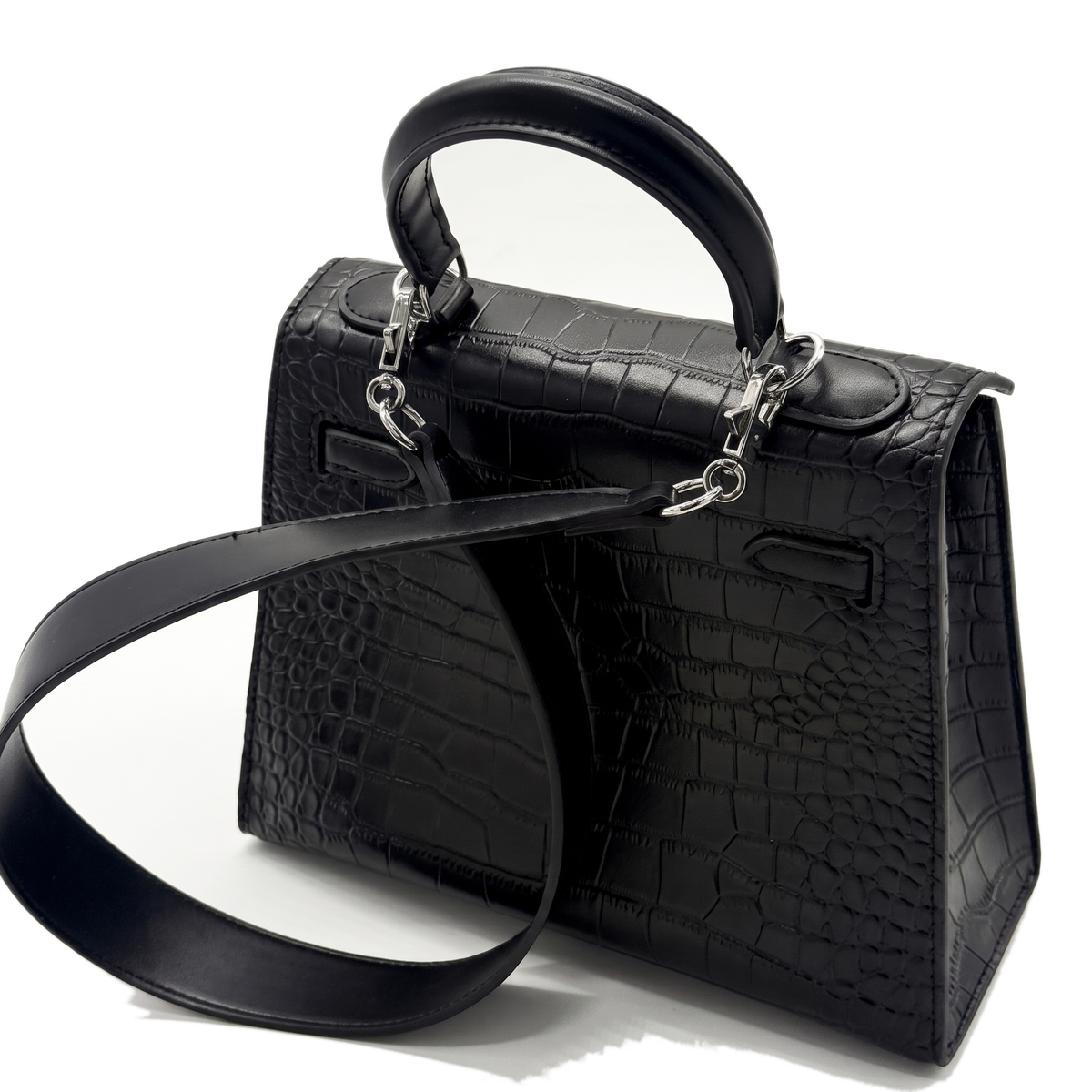 With the detachable leather strap laid out