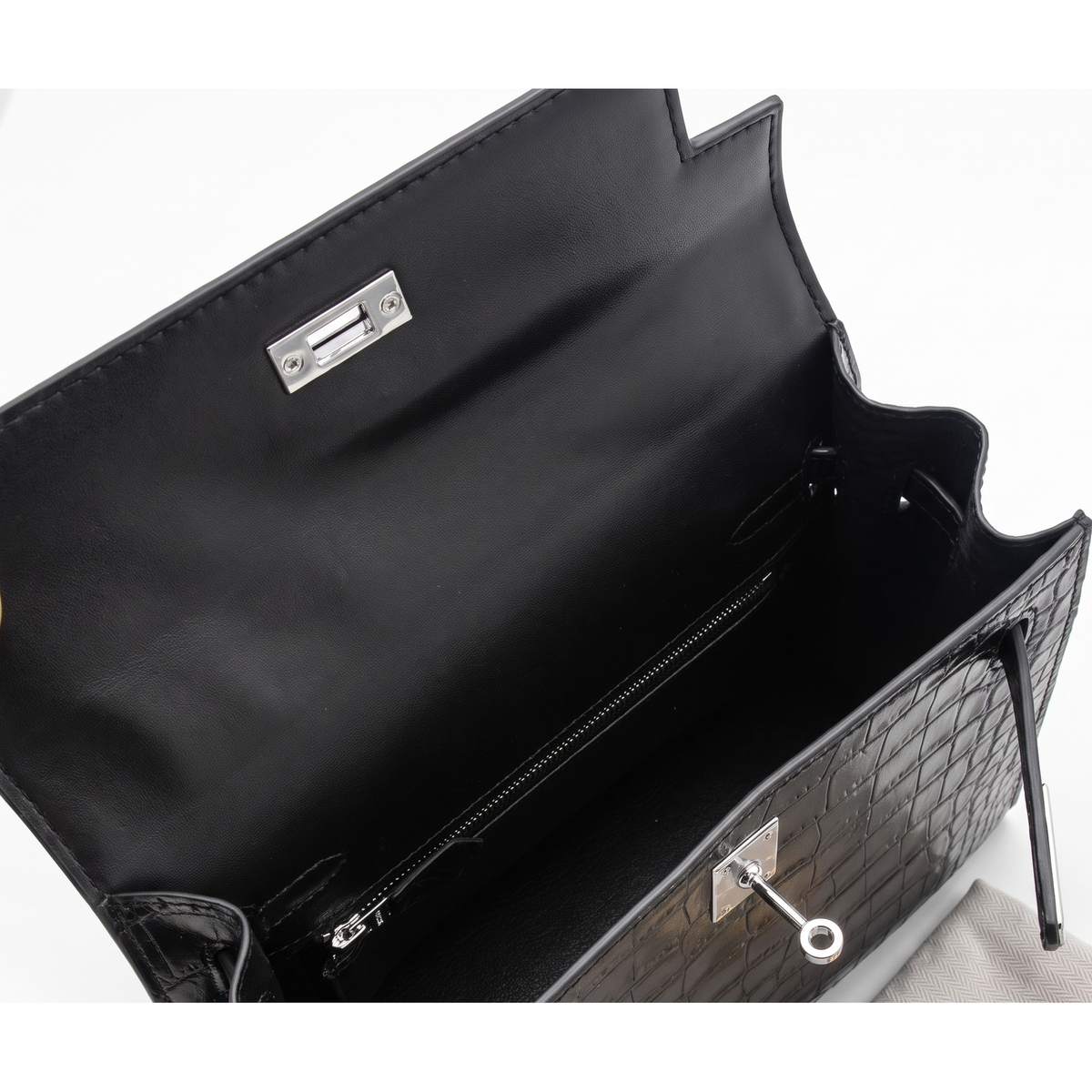 Interior, fully lined with an interior zip pocket