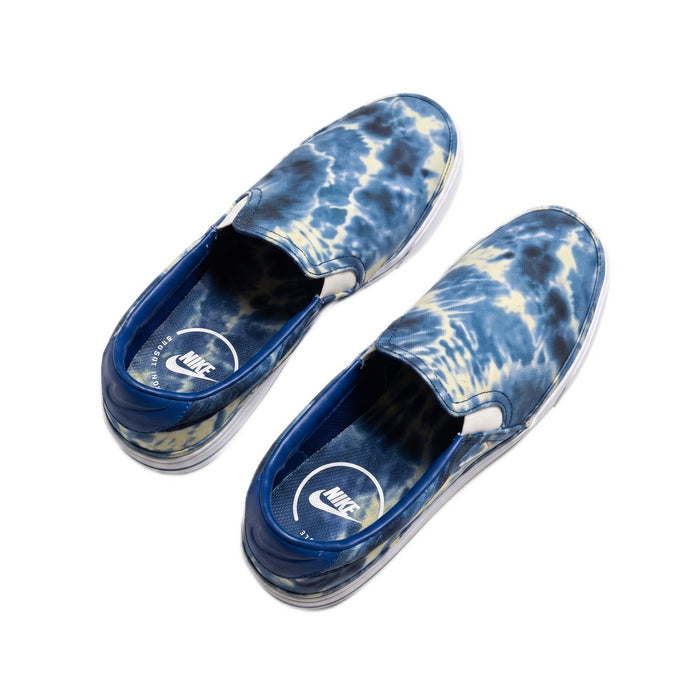 Angled overhead view of the shoes, showing the interior and outer canvas.