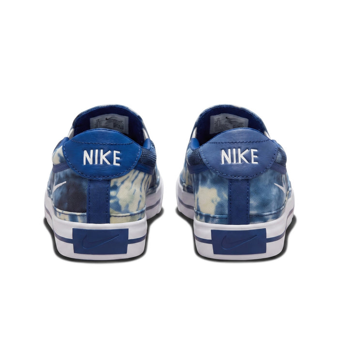 Rear view of the heels, showing the white Nike logo text on blue heel tabs.