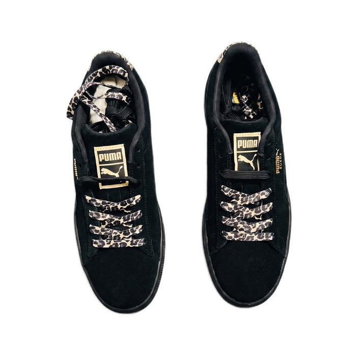 Top-down view of both shoes showing the insoles, gold tongue logos, and leopard laces.