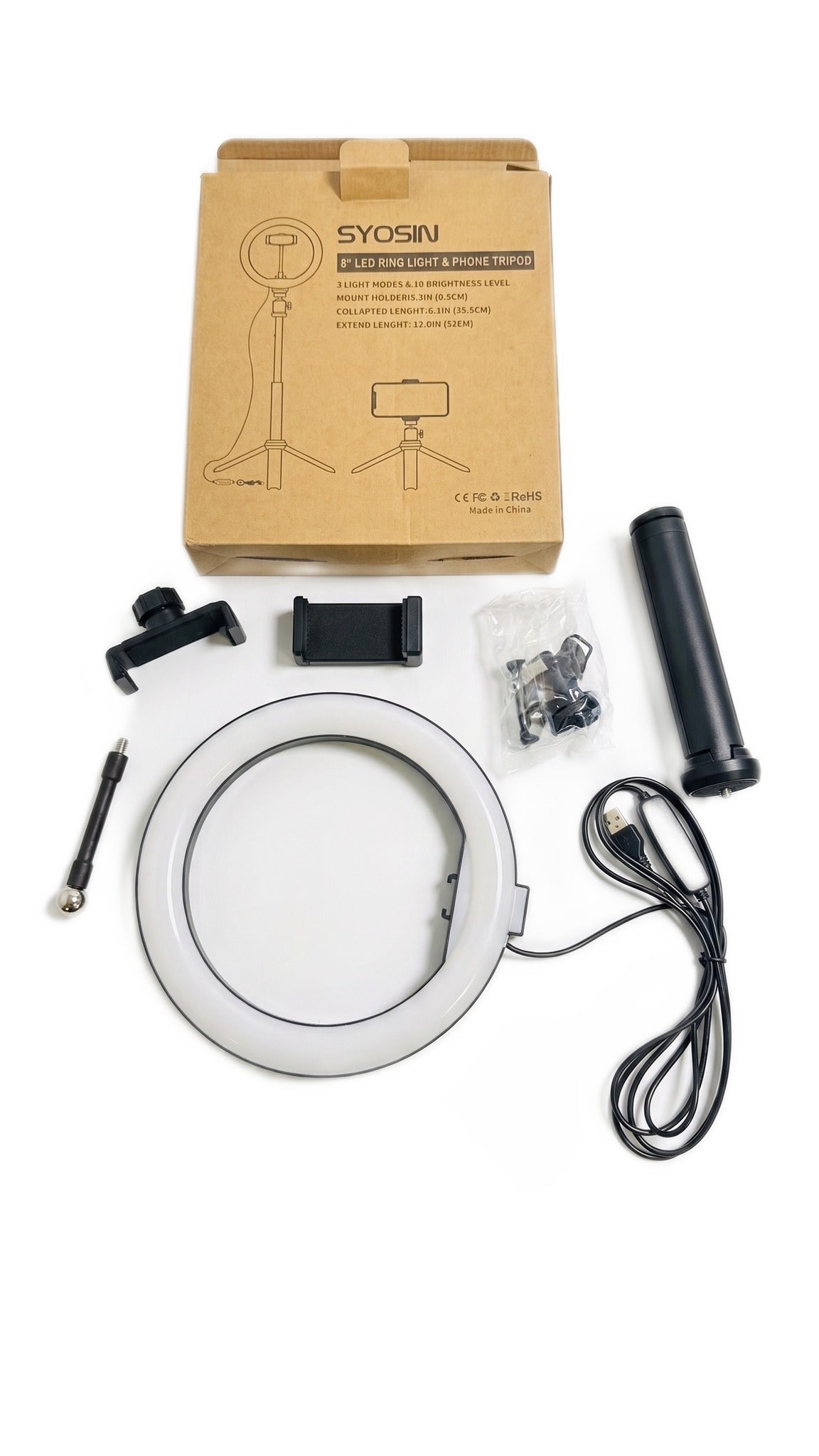 Top-down view of the unboxed ring light kit components neatly arranged below the box.