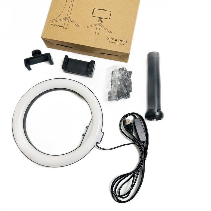 Close-up top-down view of the 8-inch ring light, USB cable, mounts, and tripod handle.