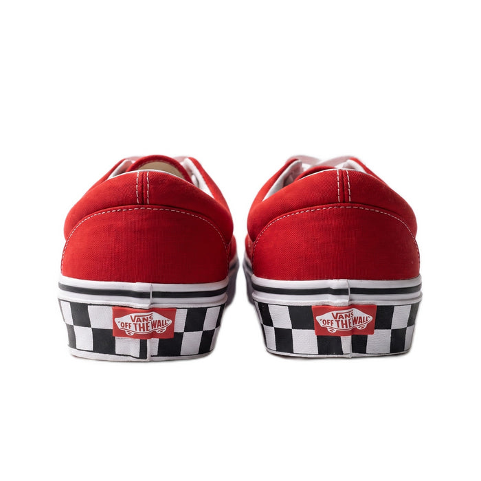 Heel view of the sneakers showing checkerboard accents on the white midsoles.